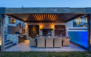 Completed landscape project in Bendemeer, Queenstown, featuring a stunning outdoor pool, surrounded by landscaped gardens and relaxing seating areas.